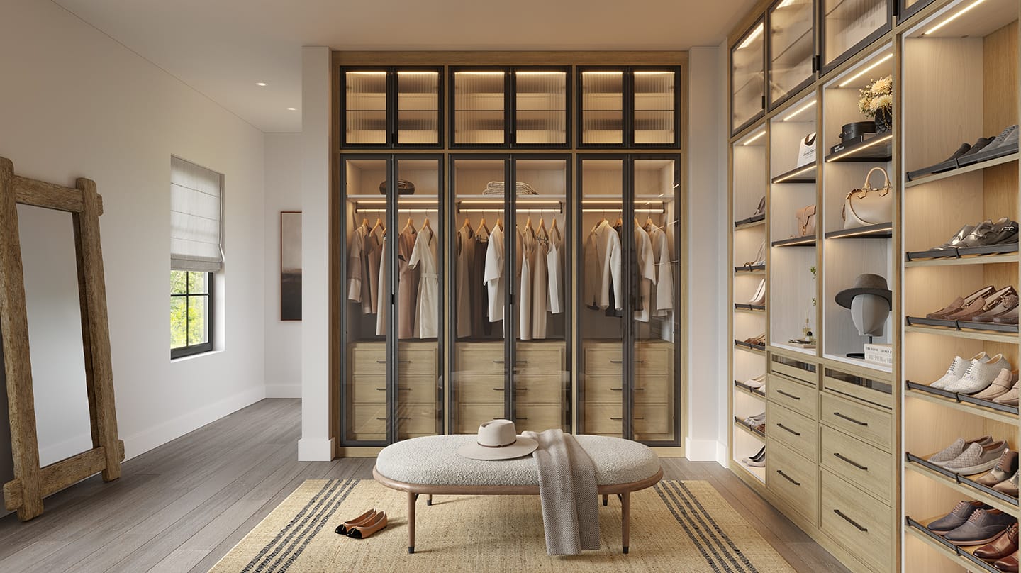 Custom closet details in light wood finish built in cabinets and shelving created by California Closets