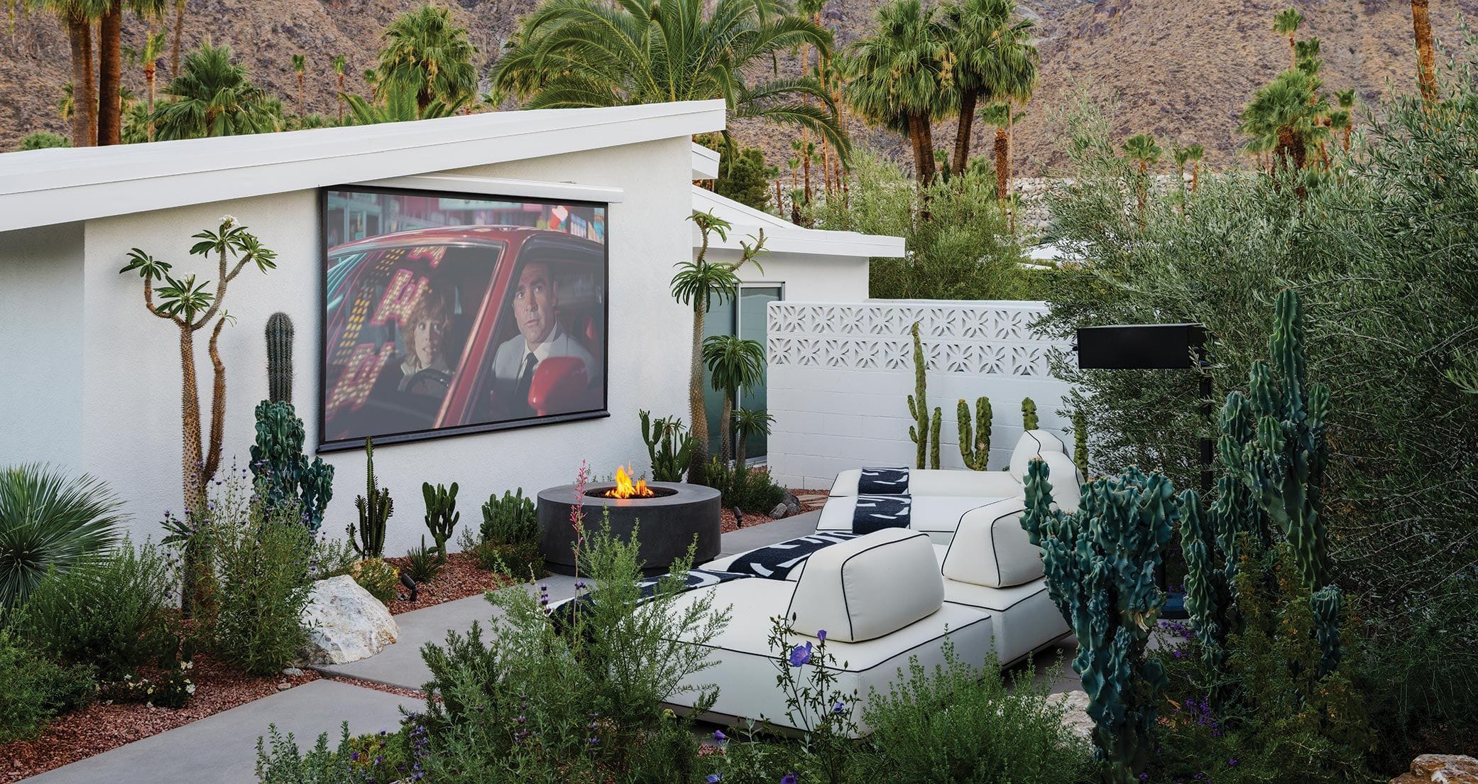 Matt Sorum's resort-like backyard includes an outdoor movie theater with surround sound, a firepit, and up-close views of the San Jacinto Mountains.